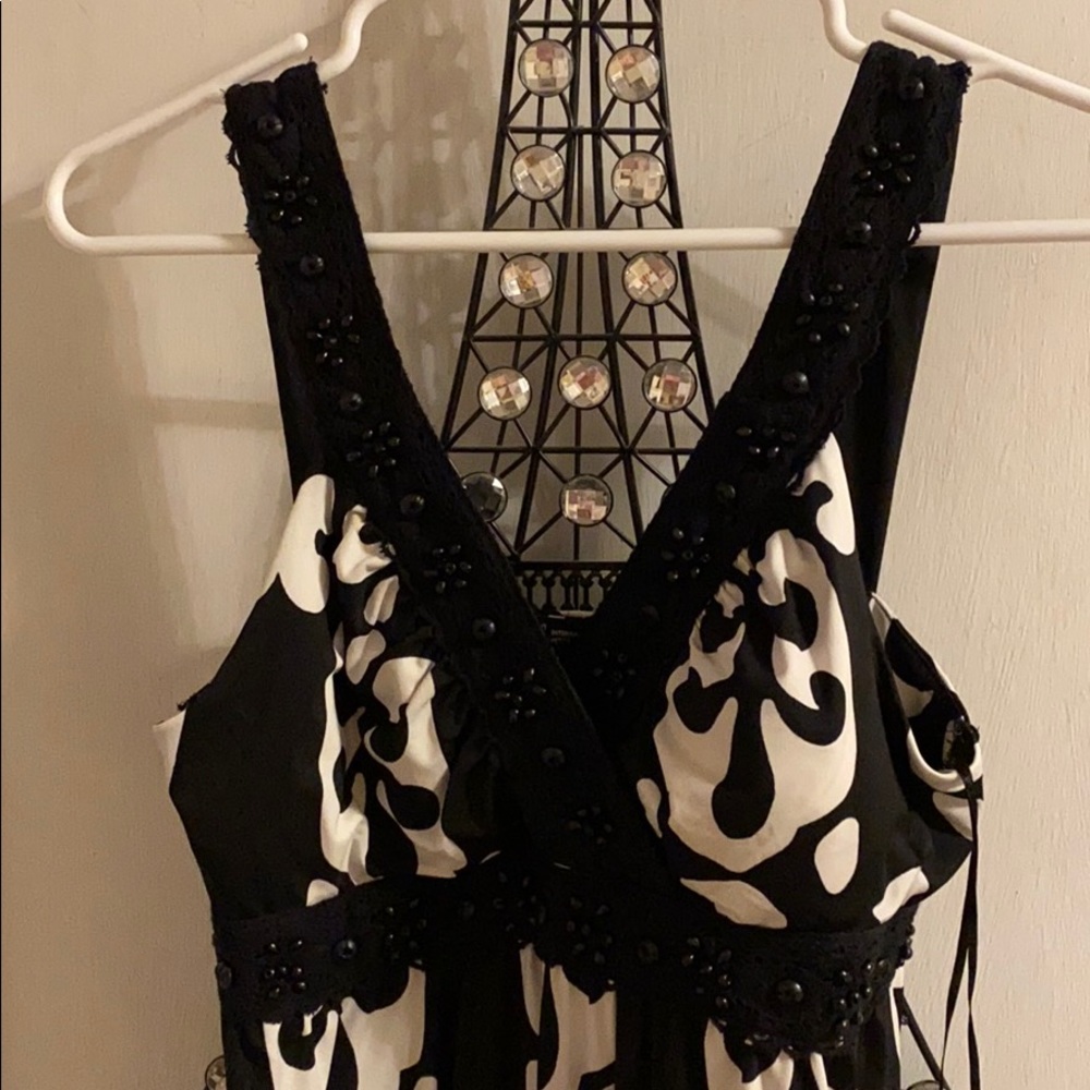 Maxi dress with beads on trim
